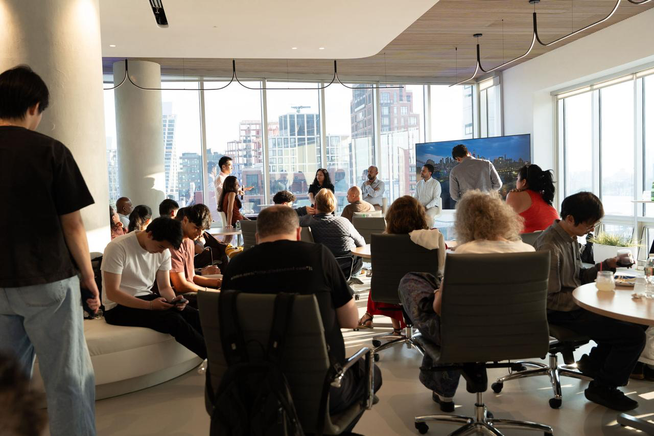 Attendees seated in a bright NYC event space during the Founder and Funder Brunch